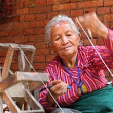 Load image into Gallery viewer, Set of Four Macrame Coasters with Fringe (Blush)